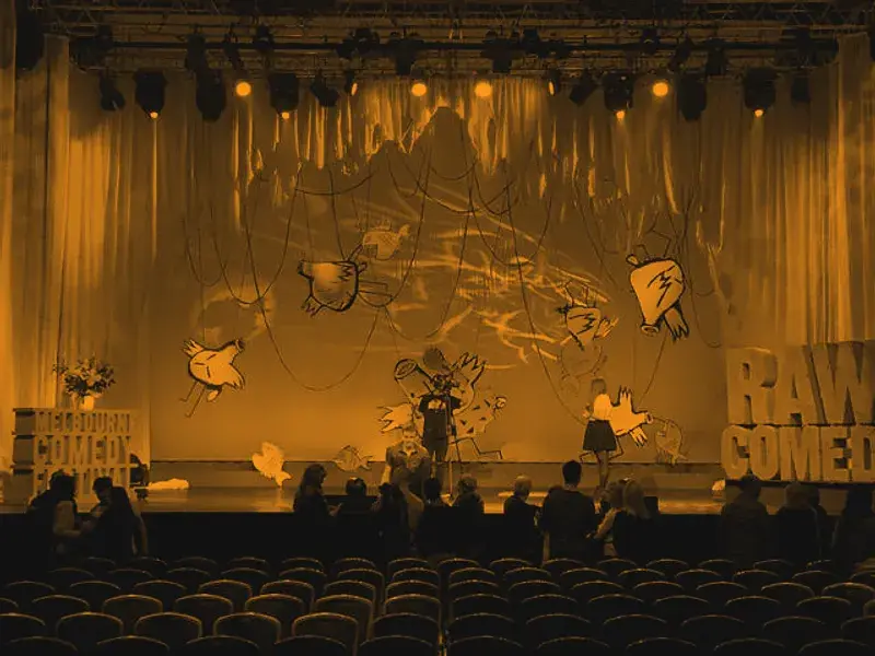 Large-format printed backdrop on a festival stage