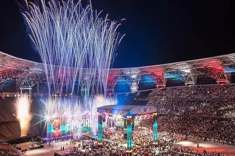 Large-format printed backdrop at a stadium-scale event