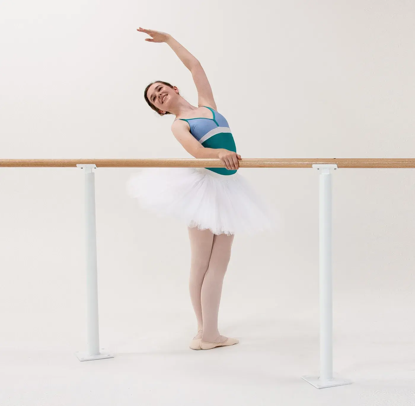 Ballet barres fitted along a studio wall