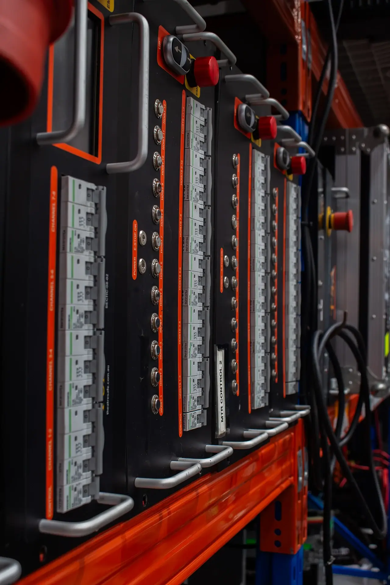 TSA hoist controllers racked and wired, one labelled channel per hoist