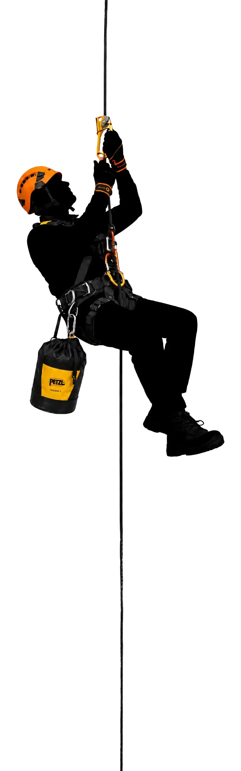 A rigger abseiling on a rope in full height-safety kit - helmet, harness, descender and rescue pack
